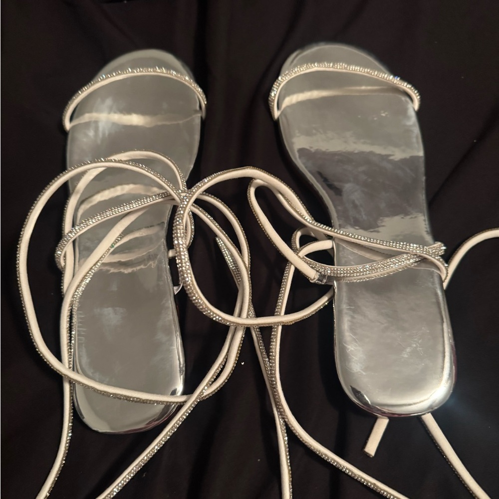 Brand new my daughter bought for prom and then went with another pair.
